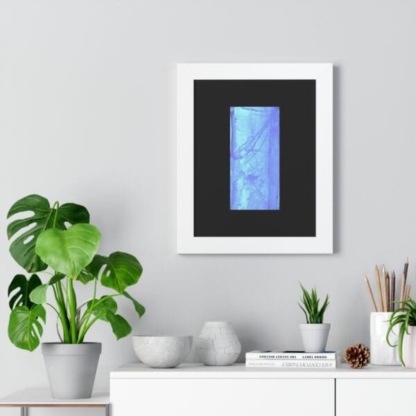 Framed blue artwork above modern shelf decor.