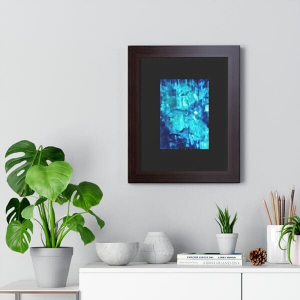 Framed abstract painting above modern shelf decor.