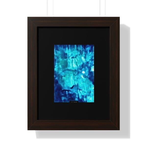 Abstract blue painting in dark wooden frame.